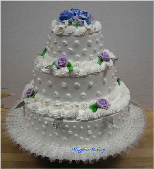 Three tier lavender wedding cake